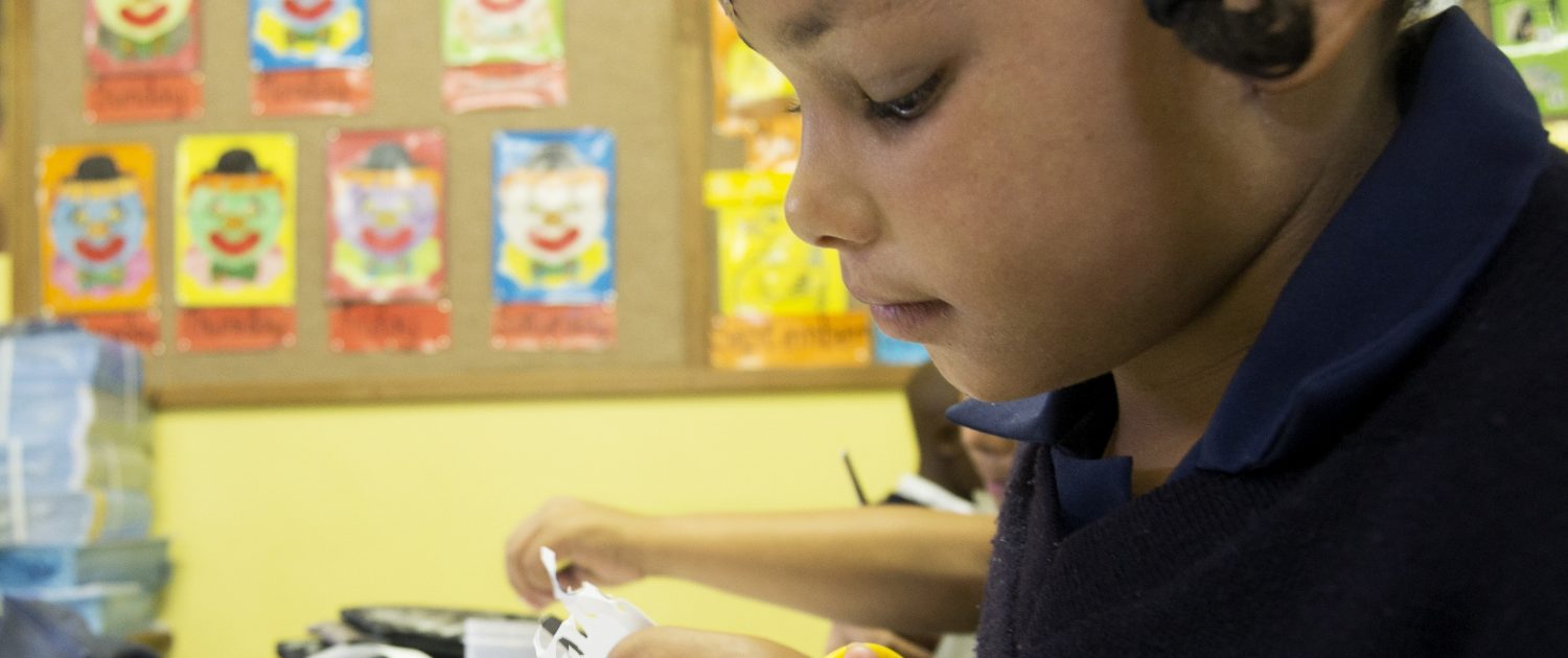 Close-up of Learner Cutting with Star on Forehead